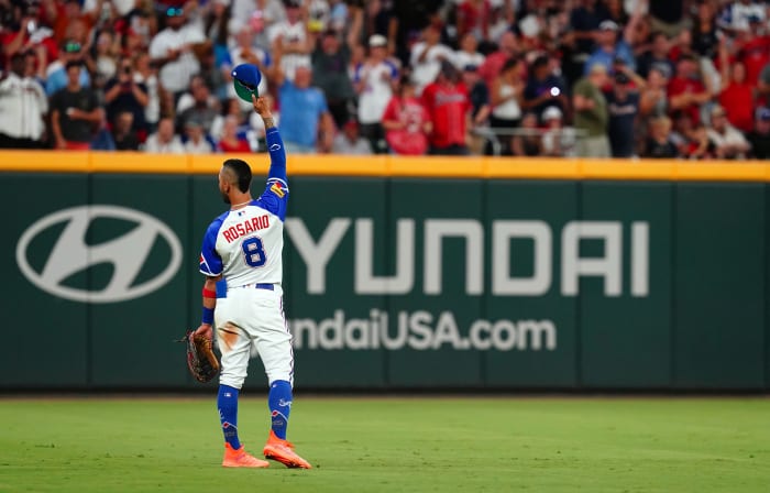 Aug 19, 2023; Cumberland, Georgia, USA; Atlanta Braves left fielder Eddie Rosario (8) acknowledges the fans after his two run home run against the San Francisco Giants during the eighth inning at Truist Park.